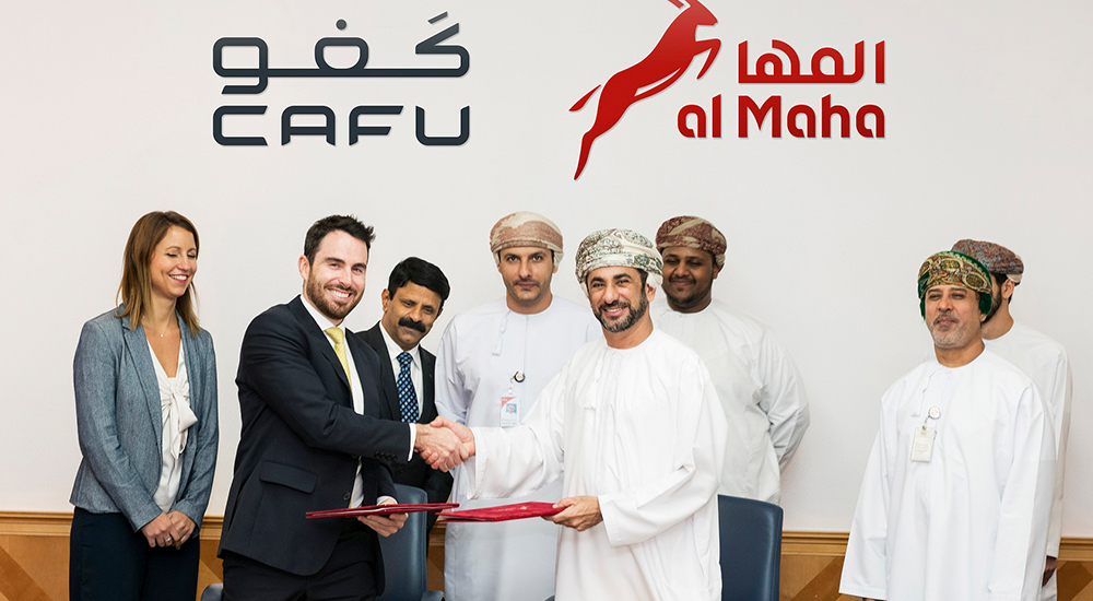 Jean-Francois Lapierre, GM of CAFU International and Eng Hamed bin Salim Al Maghdri, CEO of Al Maha Petroleum announcing the new partnership, in the presence of senior CAFU and Al Maha executives