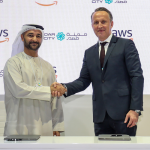 (Left and right) Amier Al Awadhi, Acting Director of Masdar City Free Zone and Wojciech Bajda, Director Public Sector Middle East and Africa, AWS.