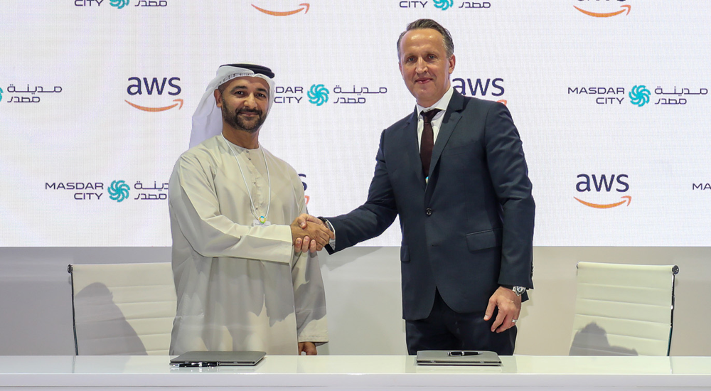 (Left and right) Amier Al Awadhi, Acting Director of Masdar City Free Zone and Wojciech Bajda, Director Public Sector Middle East and Africa, AWS.